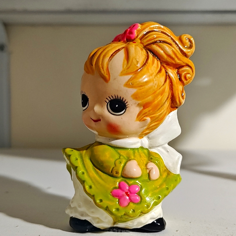 Big eyed girl figurine